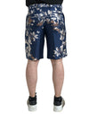 Dolce &amp; Gabbana – Seidene Bermudashorts mit Blumenmuster in Blau