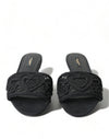 Dolce &amp; Gabbana Elegante schwarze Slidesandalen mit Herzstickerei